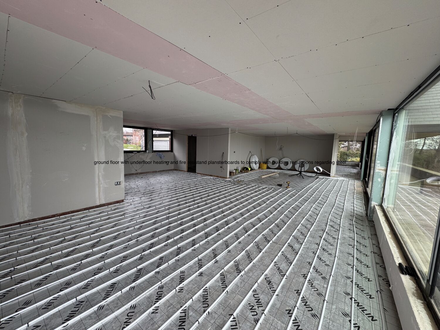 Underfloor heating and insulation to ground floor